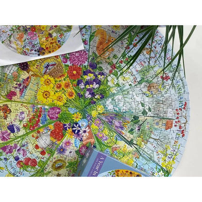 A Year in the Garden 500 Piece Round Jigsaw Puzzle Gibsons