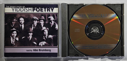 CD case with Yiddish poetry cover featuring a group of men and a gold CD inside.
